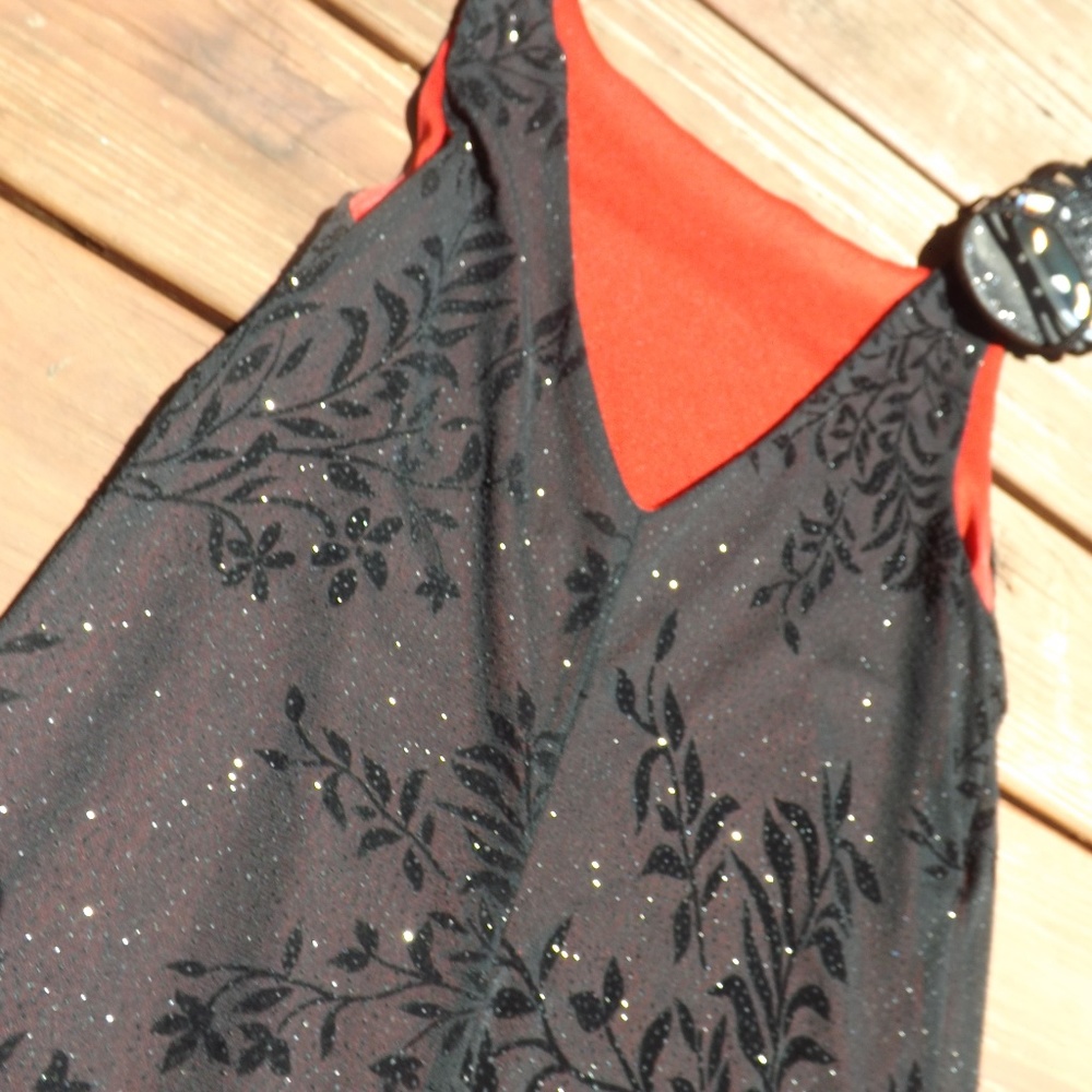 Black glitter dress with floral design and red